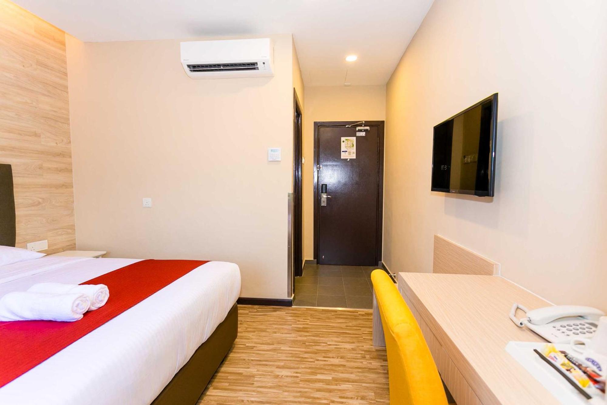 Icon Hotel Сегамат Стая снимка
