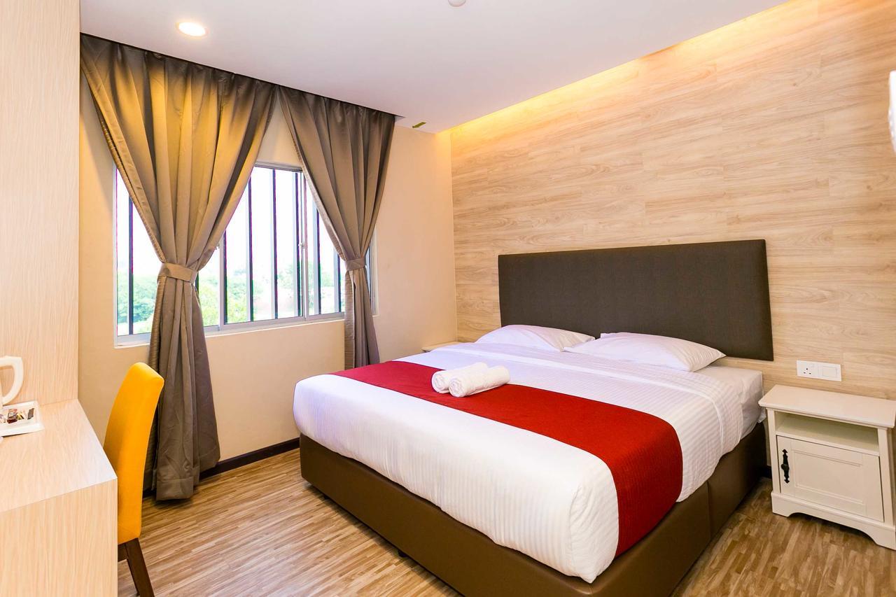 Icon Hotel Сегамат Стая снимка
